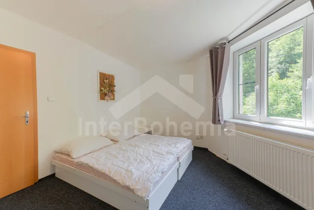 Ložnice v apartmá pro 4 osoby