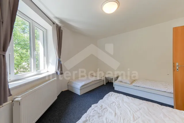 Ložnice v apartmá pro 4 osoby